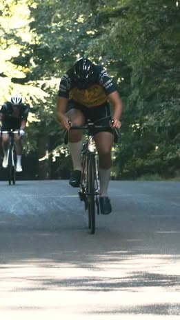 Peloton riding through town – 2024